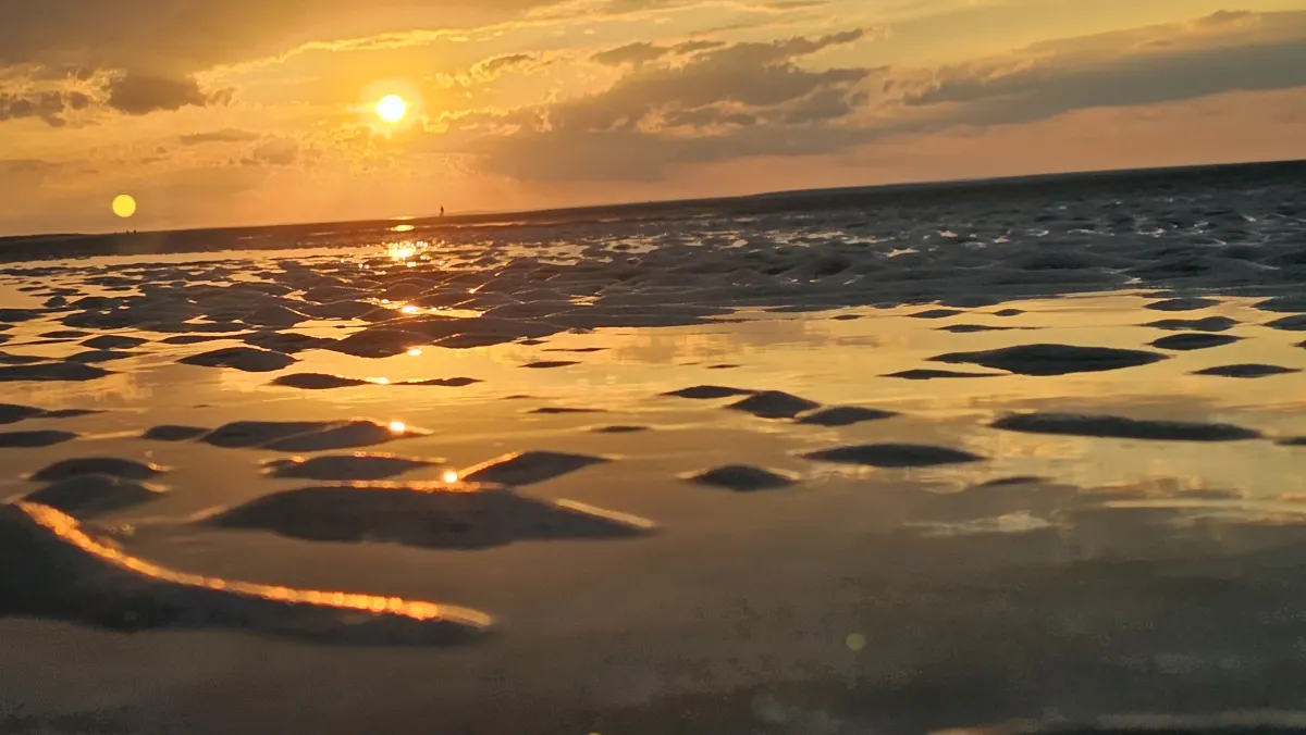 Sun setting over the tide flats on Cape Cod Bay